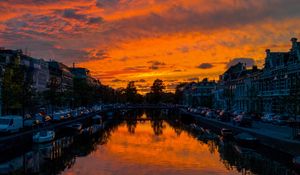 Preview wallpaper river, sunset, canal, city, netherlands