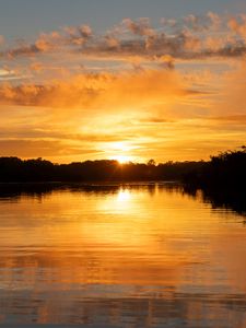 Preview wallpaper river, sunset, trees, silhouettes, clouds
