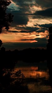 Preview wallpaper river, trees, branches, silhouettes, twilight