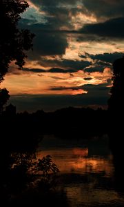 Preview wallpaper river, trees, branches, silhouettes, twilight