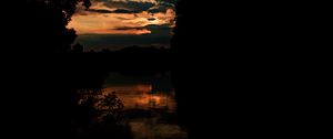 Preview wallpaper river, trees, branches, silhouettes, twilight