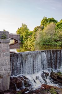 Preview wallpaper river, waterfall, stones, trees, bridge