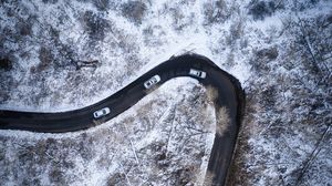 Preview wallpaper road, aerial view, cars, snowy, snow