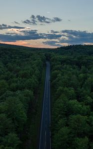 Preview wallpaper road, aerial view, forest, horizon, sunset