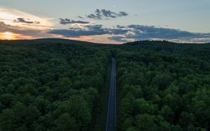 Preview wallpaper road, aerial view, forest, horizon, sunset