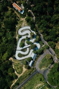 Preview wallpaper road, aerial view, forest, structure