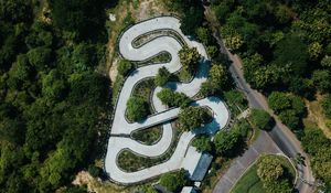 Preview wallpaper road, aerial view, forest, structure
