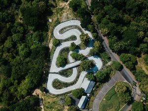 Preview wallpaper road, aerial view, forest, structure