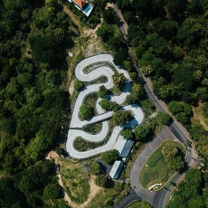 Preview wallpaper road, aerial view, forest, structure