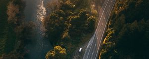 Preview wallpaper road, aerial view, river, rays, trees