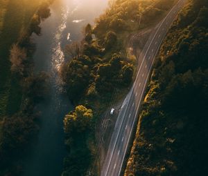Preview wallpaper road, aerial view, river, rays, trees
