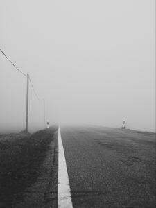 Preview wallpaper road, asphalt, fog, bw