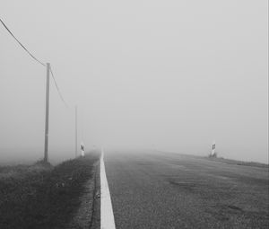 Preview wallpaper road, asphalt, fog, bw