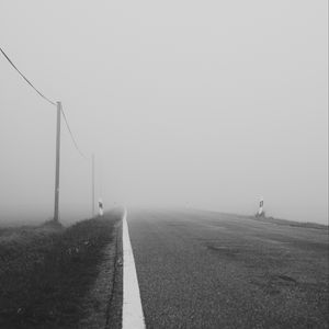 Preview wallpaper road, asphalt, fog, bw