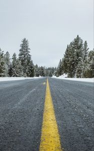 Preview wallpaper road, asphalt, forest, trees, snow, winter, nature