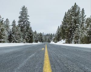 Preview wallpaper road, asphalt, forest, trees, snow, winter, nature