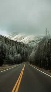 Preview wallpaper road, asphalt, forest, trees, snow, winter