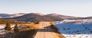 Preview wallpaper road, asphalt, hills, snow, nature