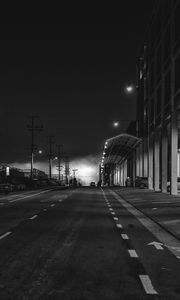 Preview wallpaper road, asphalt, lights, night, black and white