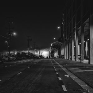 Preview wallpaper road, asphalt, lights, night, black and white