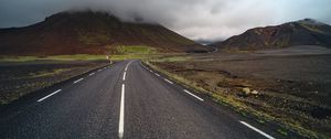 Preview wallpaper road, asphalt, mountain, clouds