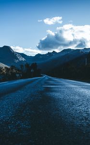 Preview wallpaper road, asphalt, mountains, clouds, direction