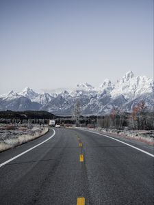 Preview wallpaper road, asphalt, mountains, turn, wyoming