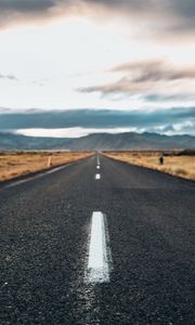 Preview wallpaper road, asphalt, mountains, clouds