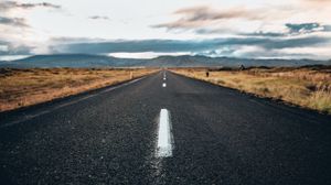 Preview wallpaper road, asphalt, mountains, clouds