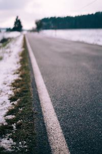 Preview wallpaper road, asphalt, snow, blur