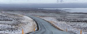 Preview wallpaper road, asphalt, snow, turn, direction, marking