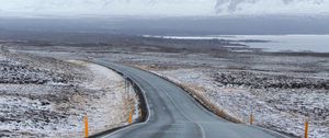 Preview wallpaper road, asphalt, snow, turn, direction, marking