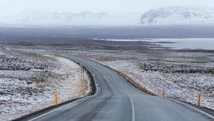 Preview wallpaper road, asphalt, snow, turn, direction, marking