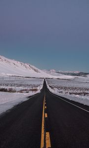 Preview wallpaper road, asphalt, snow, winter, horizon, direction