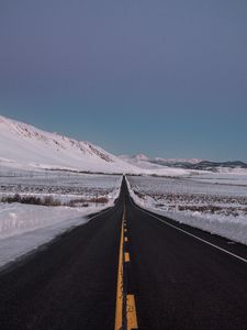 Preview wallpaper road, asphalt, snow, winter, horizon, direction