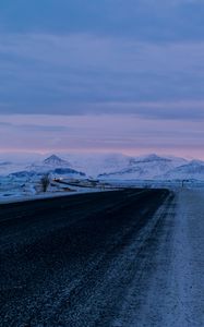 Preview wallpaper road, asphalt, snow, mountains, dusk