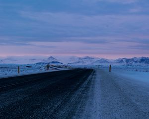 Preview wallpaper road, asphalt, snow, mountains, dusk