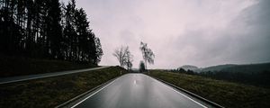 Preview wallpaper road, asphalt, trees, sky