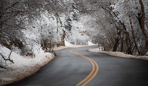 Preview wallpaper road, asphalt, turn, trees, snow, winter