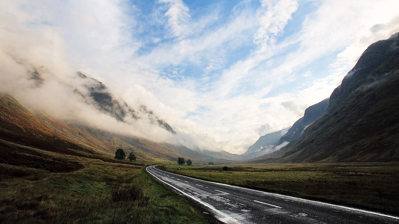 Wallpaper road, asphalt, wet, mountains, haze, sky, clouds, way, uncertainty, valley