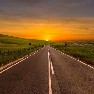 Preview wallpaper road, bending, marking, sunset, sky