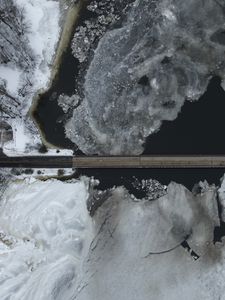 Preview wallpaper road, bridge, river, ice, snow, winter, aerial view