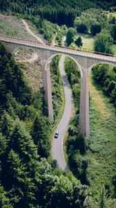 Preview wallpaper road, bridge, trees, forest, car