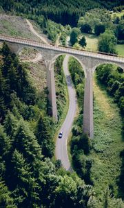 Preview wallpaper road, bridge, trees, forest, car