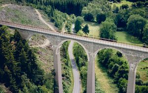 Preview wallpaper road, bridge, trees, forest, car