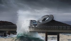 Preview wallpaper road, bridge, truck, splashes, sea, storm