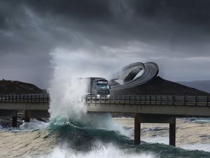 Preview wallpaper road, bridge, truck, splashes, sea, storm