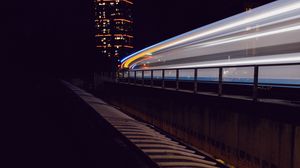 Preview wallpaper road, building, lights, glow, long exposure, night