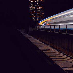 Preview wallpaper road, building, lights, glow, long exposure, night