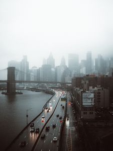 Preview wallpaper road, buildings, aerial view, city, fog